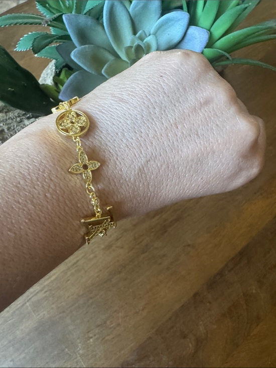Louis Vuitton Jewelry - Louis Vuitton Gold Charm Bracelet with Monogram Motifs